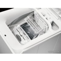 Стиральная машина с вертикальной загрузкой Electrolux EWT1062IDW