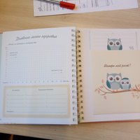 Книга издательства Эксмо. Первая книга обо мне. Фотоальбом малышки