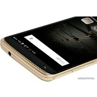 Телефон ZTE Axon Mini Gold