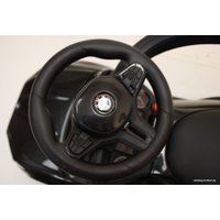 Каталка RiverToys BMW M5 A999MP-M (черный)