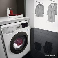 Стирально-сушильная машина AEG L99695HWD