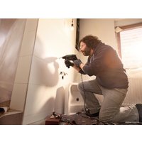 Ударная дрель Bosch UniversalImpact 700 [0603131020]