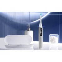 Электрическая зубная щетка Oral-B iO 6 (с насадкой Ultimate Clean 4 шт, серый)