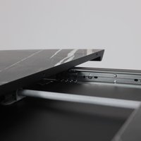 Кухонный стол Listvig Merlin 110-150х75 (МДФ+HPL-пластик черный Sahara Noir/черный)