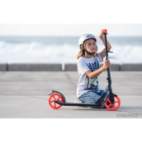 Двухколесный подростковый самокат Oxelo Mid 7 с подножкой (синий/оранжевый)