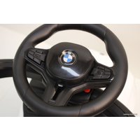 Каталка RiverToys BMW M5 A999MP-M (белый)