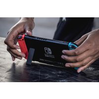 Игровая приставка Nintendo Switch (с неоновыми Joy-Con)