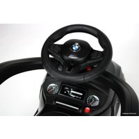 Каталка RiverToys BMW M5 A999MP-H (черный)