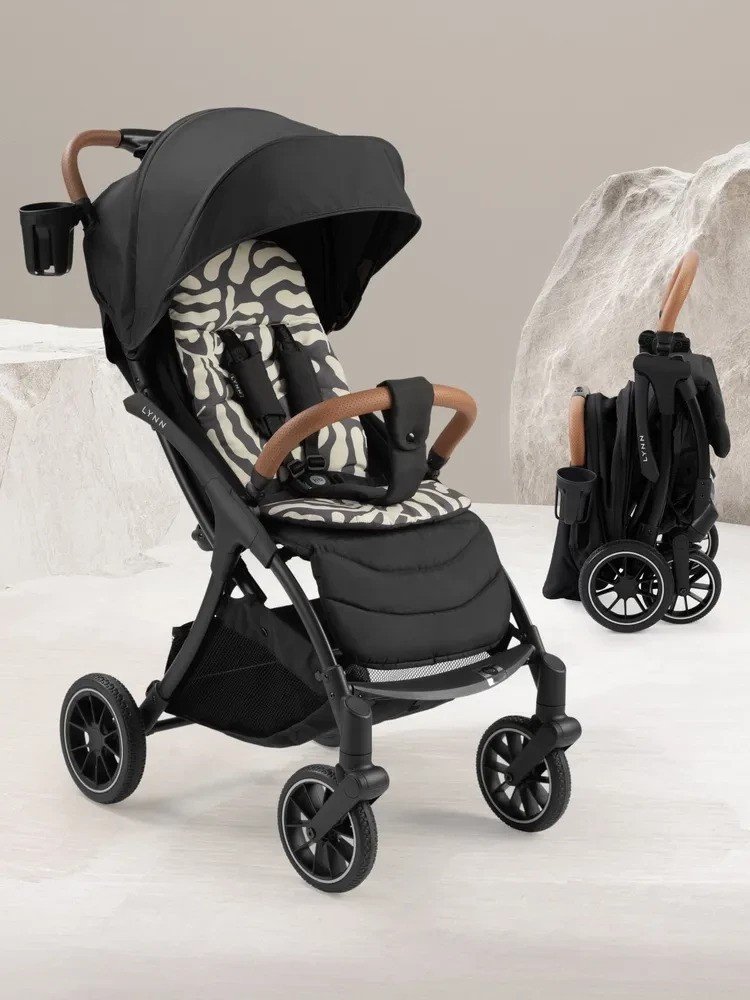 

Коляска прогулочная «книга» Happy Baby Lynn (black & flora)