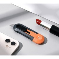 Нож строительный Deli HT4007C