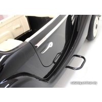 Электромобиль RiverToys Mercedes-Benz M111MM (черный глнянец)