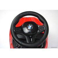 Каталка RiverToys BMW M5 A999MP-D (красный)