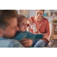 Ручной молокоотсос Philips Avent Natural Motion с бутылочкой для кормления SCD210/03