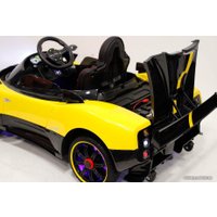 Электромобиль RiverToys Pagani Zonda Cinque A009AA (желтый)
