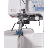 Коверлок Janome 1200D