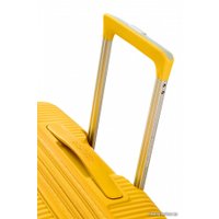 Чемодан-спиннер American Tourister SoundBox Golden Yellow 67 см