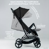 Коляска прогулочная «книга» Bubago Axi (черный)