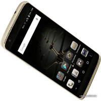 Телефон ZTE Axon Mini Gold