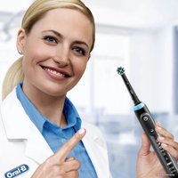 Электрическая зубная щетка Oral-B Genius X 20000N D706.515.6X (черный)