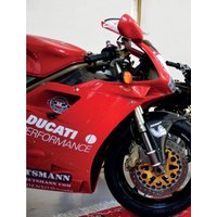 Книга издательства Бомбора. История мотоцикла (Хаммонд Ричард)