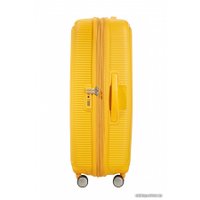 Чемодан-спиннер American Tourister SoundBox Golden Yellow 77 см