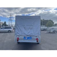 Одноосный прицеп Кремень Профи 2.5x1.56x0.5 (тент 120 см, усиленный передний и задний борт)