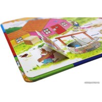 Книга издательства Эксмо. 3+ 100 окошек - открывай-ка! (илл. Тони Вульфа)