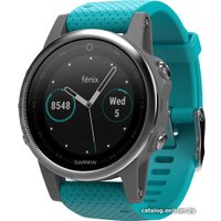 Умные часы Garmin Fenix 5S 42mm (серебристый/бирюзовый) [010-01685-01]