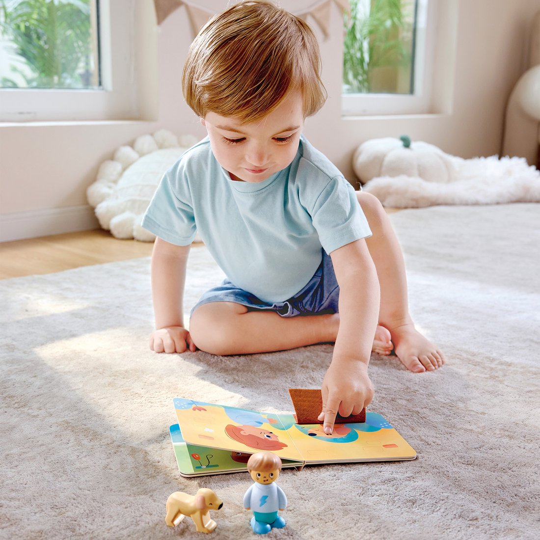 

Развивающая игра Hape Мальчик и собака E3431_HP